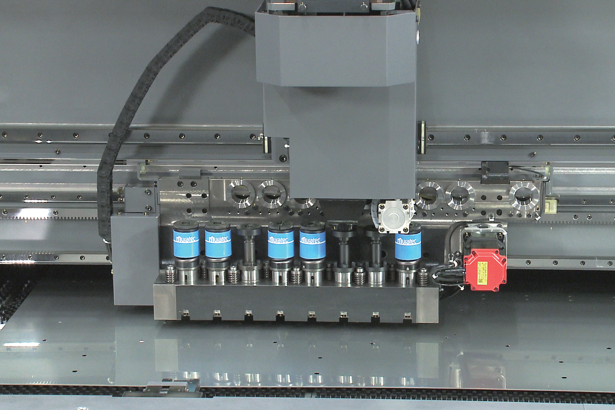 Feature Productions Machine Fabrication Machine Automates Production of Flat Parts | Modern Machine ...