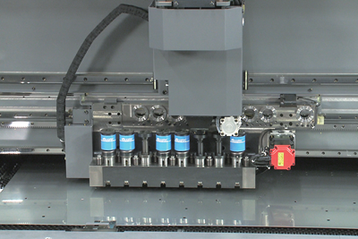 Fabrication Machine Automates Production of Flat Parts