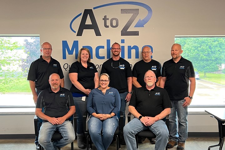 A photo of the eight people who make up A to Z Machine's employee leadership team.