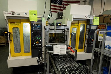 A photo of two FANUC RoboDrills in a JobShop Cell