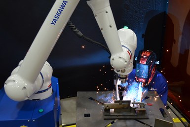 HC10 robot collaborating with man welding