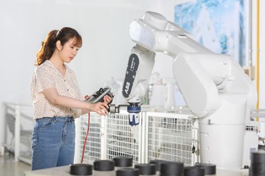 A person with the cobot.