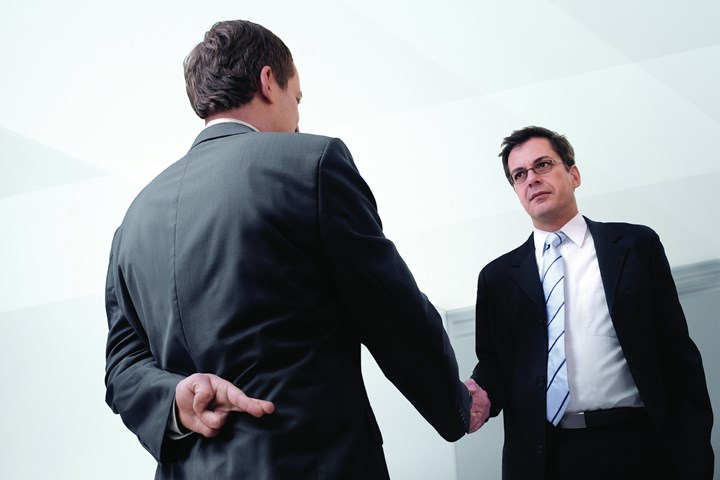 Salespeople shaking hands