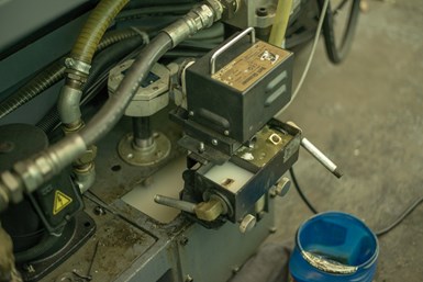 A second photo of a skimmer pulling oil off coolant