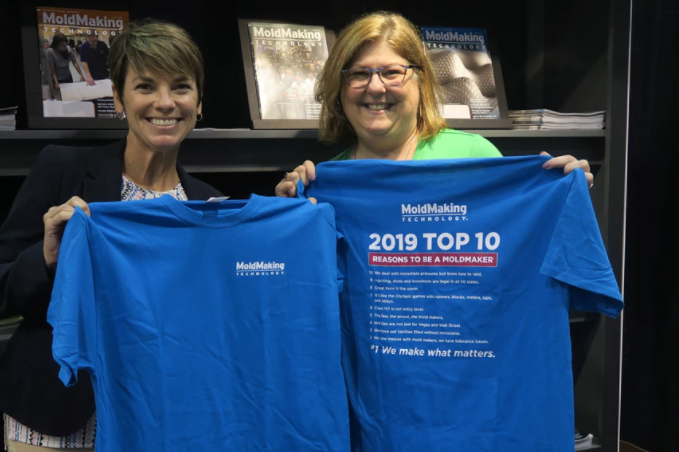 MMT Editorial Director Christina Fuges with the Amerimold 2019 Top 10 Reasons to be a Moldmaker t-shirt.