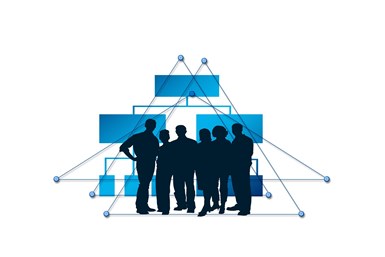 A stock photo showing a group of silhouetted people superimposed on a stylized data tree