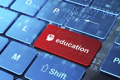 A keyboard that says education.