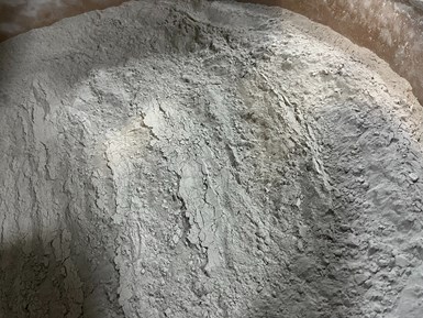 Photo of grayish white powder sent back for recycling