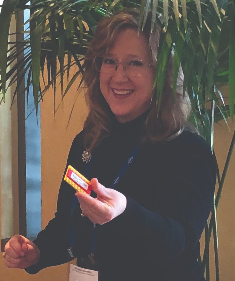 PMPA’s Executive Director, Cate Smith, hands out LEGO® name tags to all attendees.