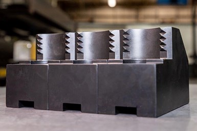 The jaws are designed to bite into the workpiece, providing increased holding power during turning operations. Photo Credit: Dillon Manufacturing