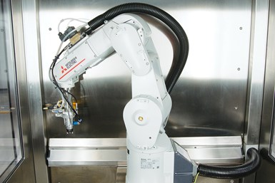 Made entirely of stainless steel, the cleaning system has smooth surfaces and comes with a robot as standard. It is said it can be easily integrated into connected production lines and digitally controlled. Photo Credit: ACP Systems