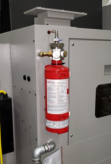 Firetrace cylinder attached to a machine tool