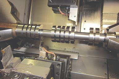inside a twin-turret, twin-spindle lathe