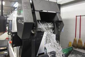 Hennig chip conveyor for CNC machining centers