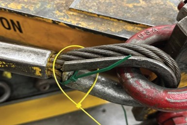 Color-coded cable ties on a sling