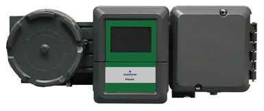 Photo of Emerson Fisher DPC2K controller, painted dark green with electronic control panel and digital readout. 