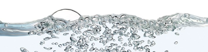 Image of water bubbles on neutral white background