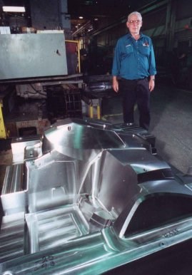 Cavalier Tool & Manufacturing co-founder Rick Janisse with a large injection mold.