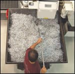 Fast cycle time keeps machine operator Victor Martinez busy emptying the machine’s chip bin