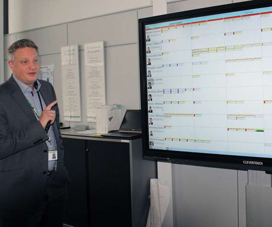 Sven Holsten explains the company’s unique touchscreen planning tool on a large screen.