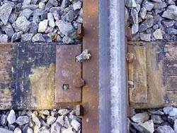 Composite wraps strengthen and extend life of railroad ties